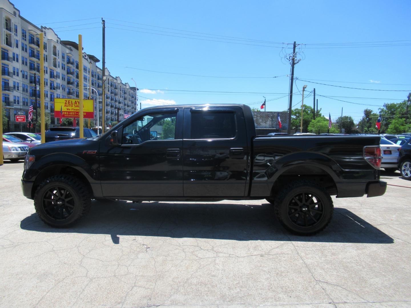 2012 Black /Black Ford F-150 FX2 SuperCrew 5.5-ft. Bed 2WD (1FTEW1CM7CK) with an 3.7L V6 DOHC 24V engine, Automatic transmission, located at 1511 North Shepherd Dr., Houston, TX, 77008, (281) 657-1221, 29.798361, -95.412560 - 2012 FORD F-150 XLT VIN: 1FTEW1CM7CKE33655 1 F T E W 1 C M 7 C K E 3 3 6 5 5 CREW PICKUP 3.7L V6 F DOHC 24V FLEX FUEL REAR WHEEL DRIVE - Photo#21